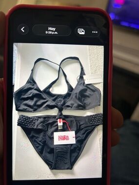 SOLID & STRIPED black knotted bikini with braided sides